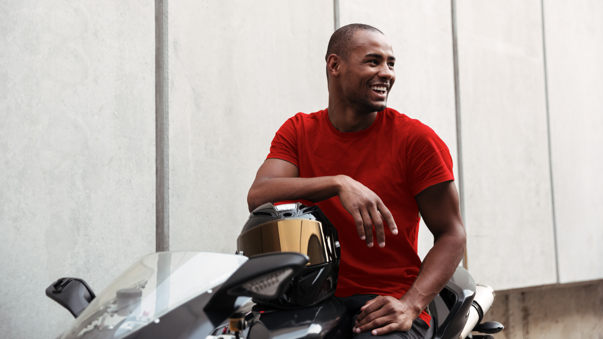 Man smiling on motorcyle